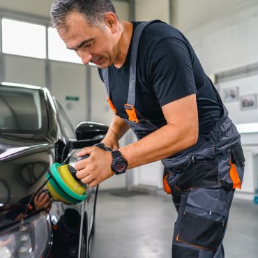 Mechanic working on car
